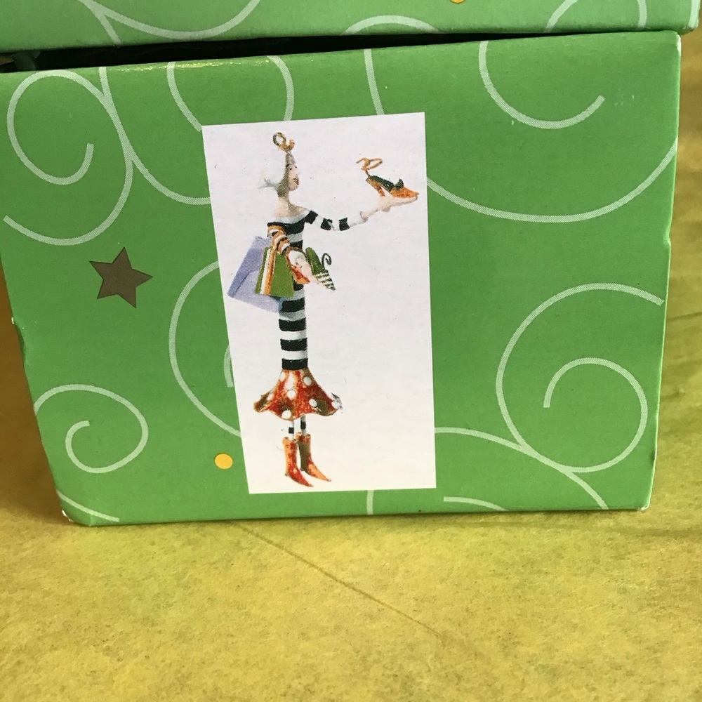 1 lollysticks ornament. Striped tall lady.